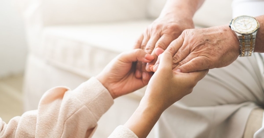 holding hands with elder