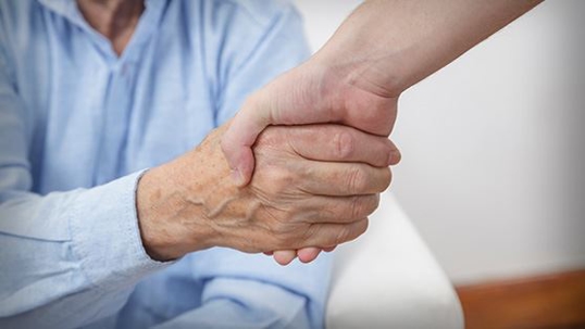Two people shaking hands